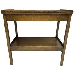 Early 20th century oak card table, fold-over and swivel rectangular top with baize lining, square supports united by undertier 