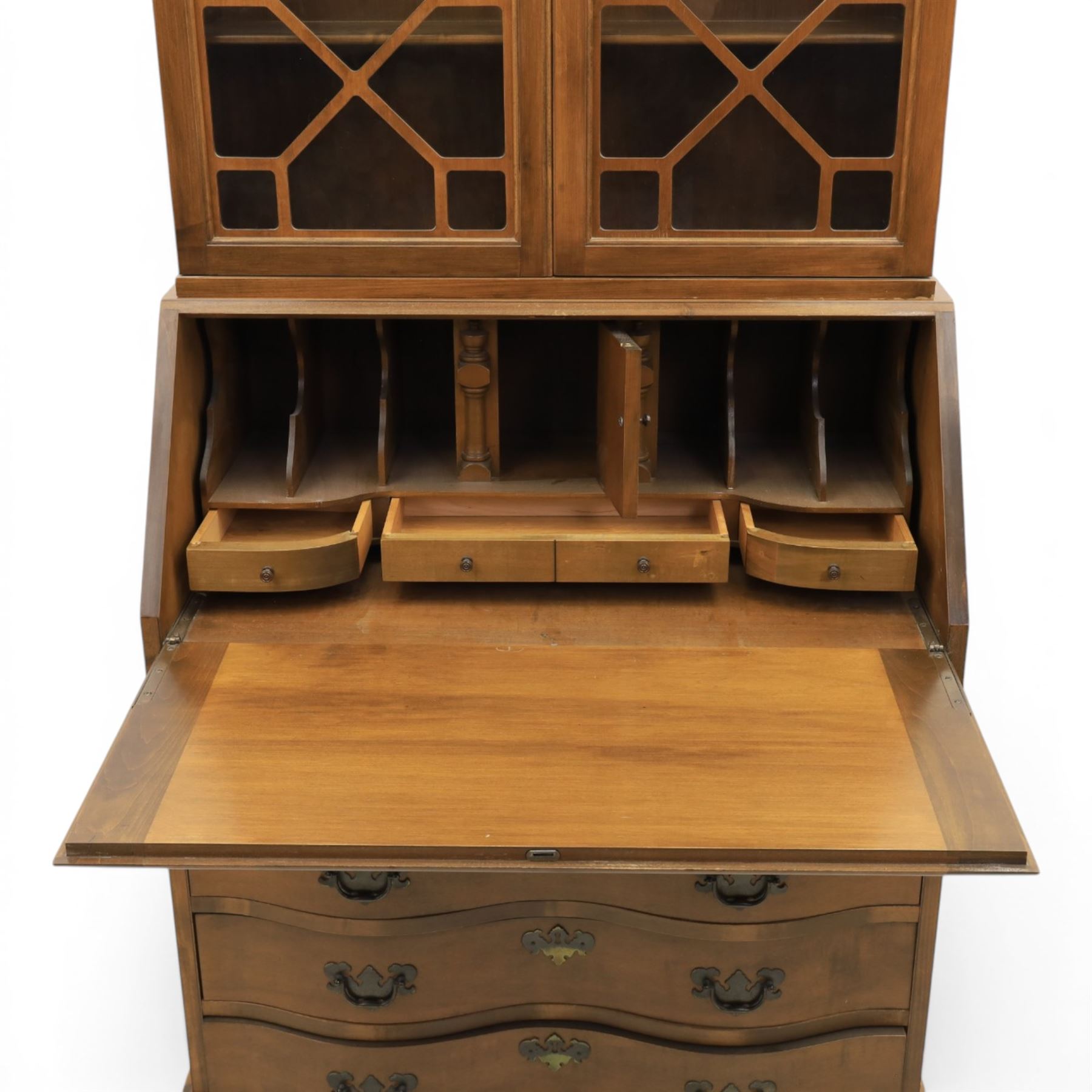 Maddox of Jamestown New York - Georgian design mahogany bureau bookcase, broken arch pediment with central finial, astragal glazed bookcase, above a fall front writing slope with fitted interior, four serpentine drawers, raised on claw on ball feet 