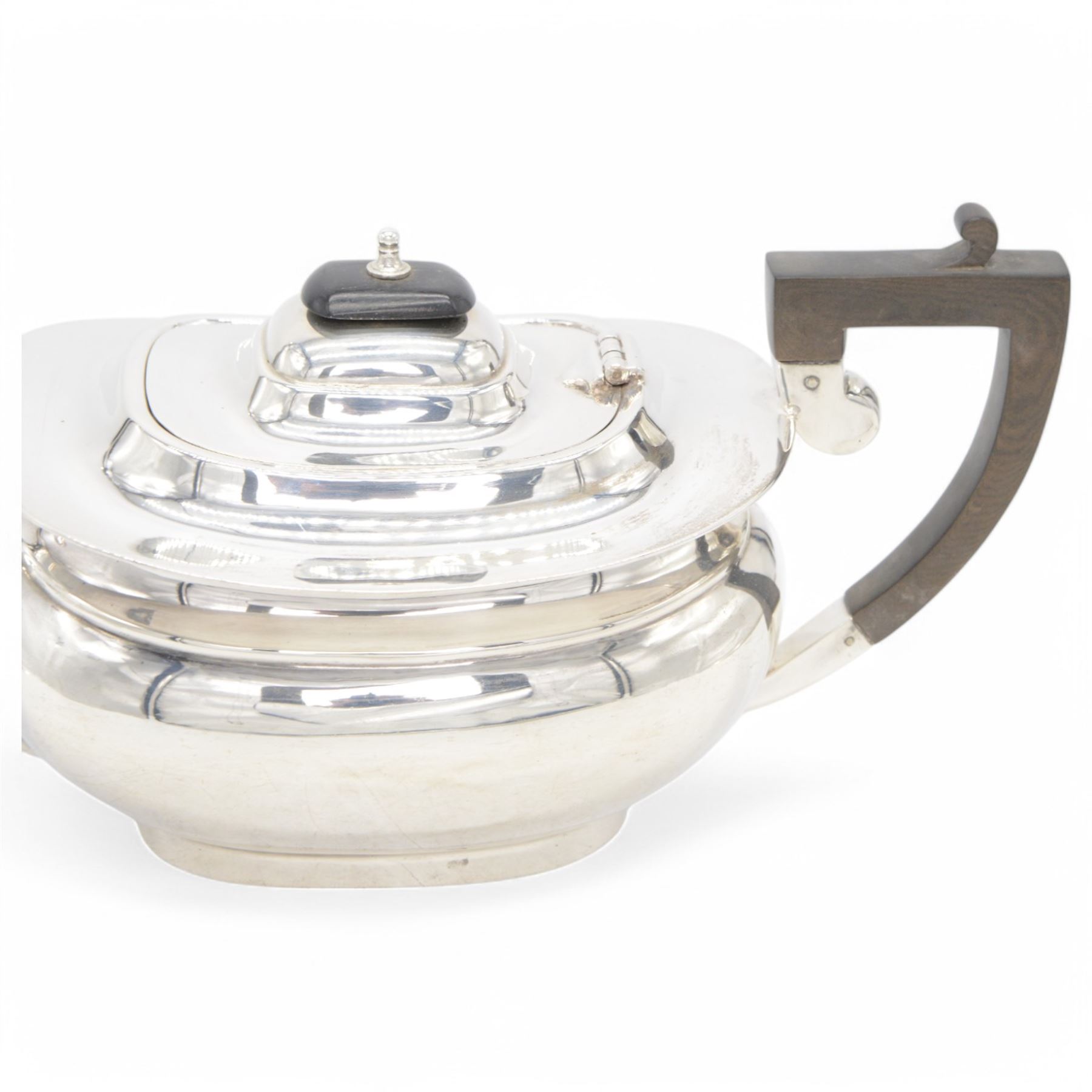1920s silver tea pot, of oval bellied form, with Bakelite type handle and finial, hallmarked C W Fletcher & Son Ltd, Sheffield 1923, H15cm