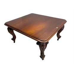 Victorian mahogany extending dining table, moulded rectangular top with rounded corners, telescopic mechanism with leaf and winding handle, on leaf and cartouche carved cabriole supports, brass and ceramic castors