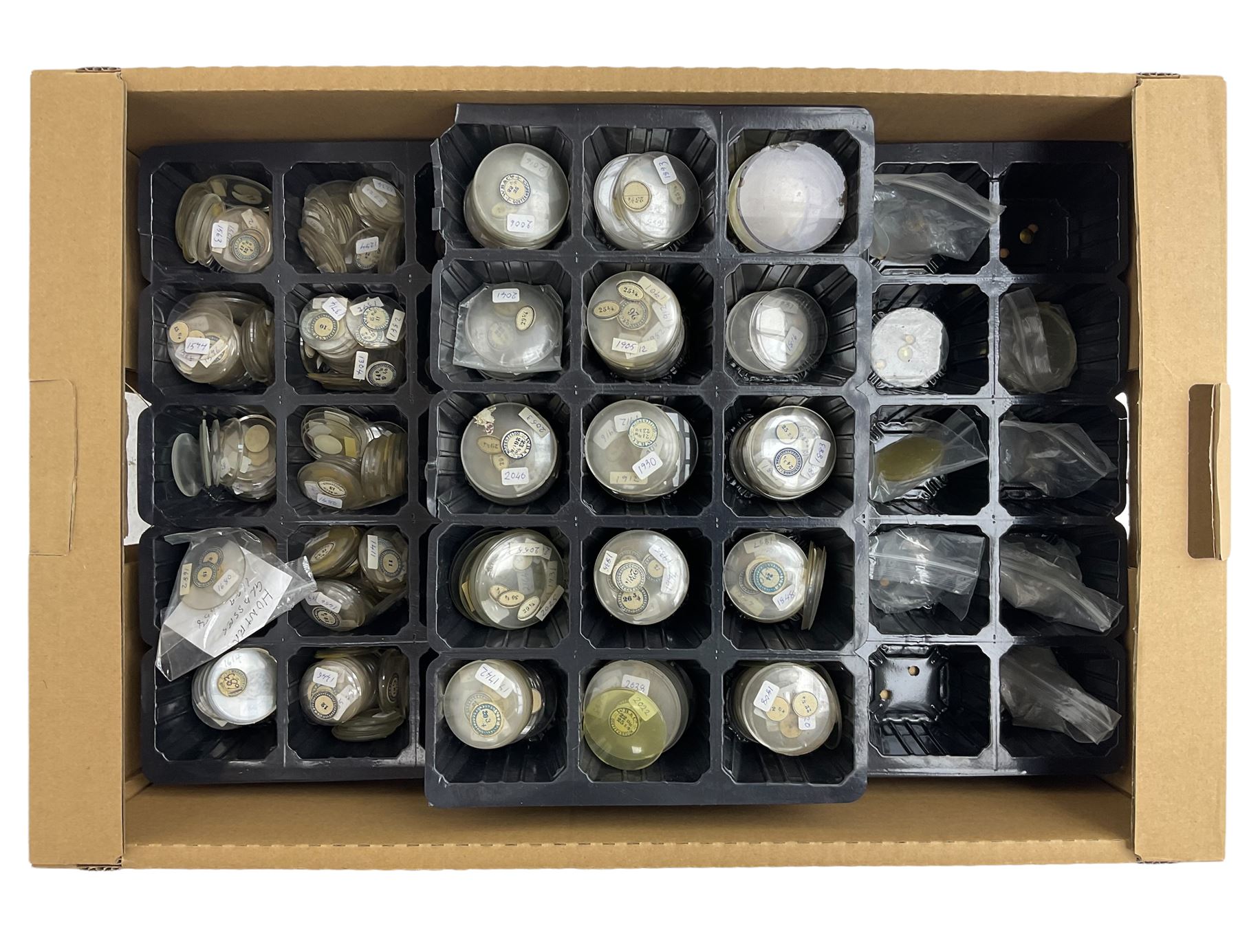 Large assortment of pocket watch crystals of assorted sizes