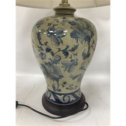 Pair of table lamps of baluster form, decorated with stylised flowers upon a mottled ground, with shade H68cm