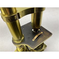 19th century brass monocular microscope by R. & J. Beck London No.18760 with hinged column and pitchfork base H25cm; in fitted mahogany case with two lenses