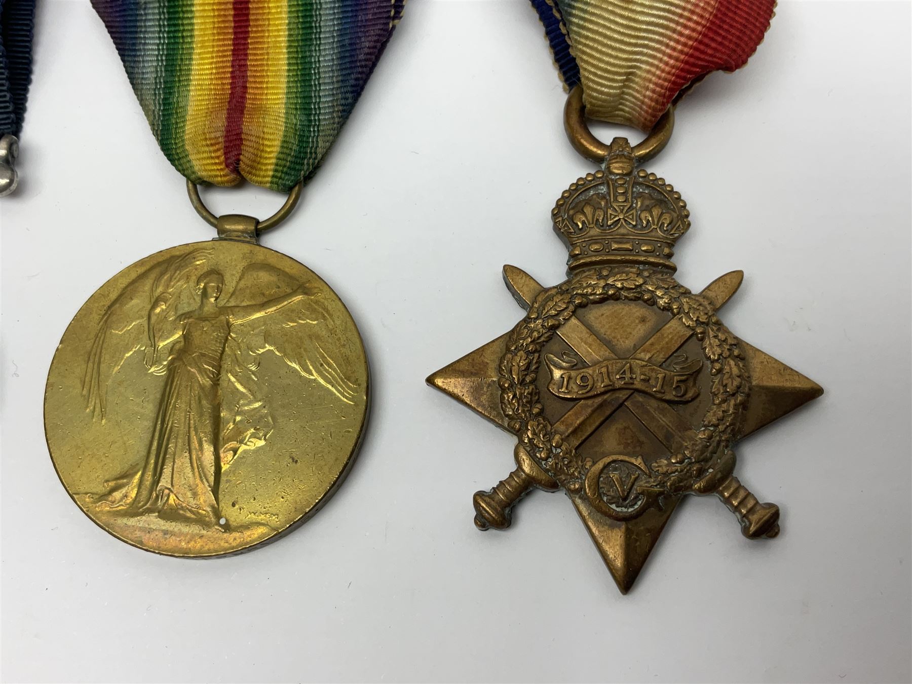 WWI RAMC Military Medal group of four comprising MM awarded to 439278 Pte. R.W. Sainsbury 1/3 S.M.F.A. R.A.M.C. T.F., British War Medal, Victory Medal and 1914-15 Star awarded to 2160 Pte. R.W. Sainsbury R.A.M.C.; all with ribbons; together with RAMC shoulder title
