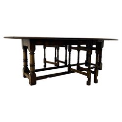 Large 18th century design oak wake or dining table, oval drop-leaf top, turned supports with double gate-leg action base, united by moulded stretchers 