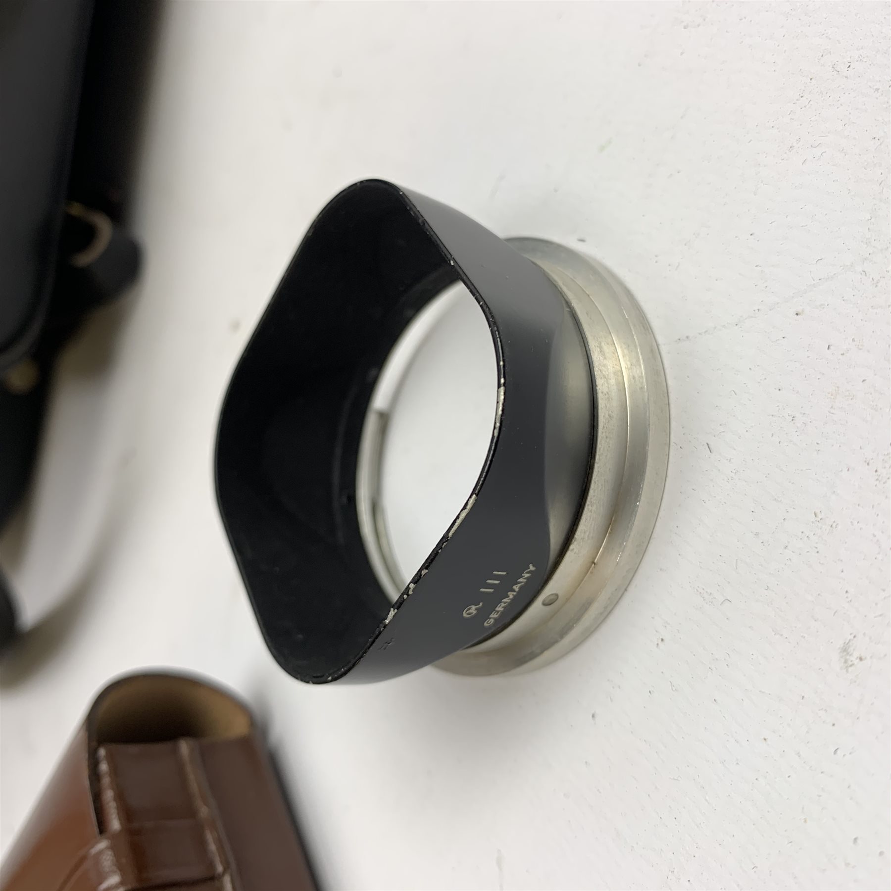 Rolleiflex 2.8F camera in leather case together with; 'In Practical Use' instruction manual, Rolleipol -1.5 lens in case, Rollei Rolleiflex lens hood Bay III in case, Rollei Gelb Mittel -1.5 filter in case, Rollei R1 -0 lens in case, Heidosmat-Rolleinar 1 with Rolleinar 1, Weston Master IV light meter and Weston Master IV Invercone in cases, Rollei Rolleiflex Rolleikin in case, hand grip with Rolleifix plat, all in carry case