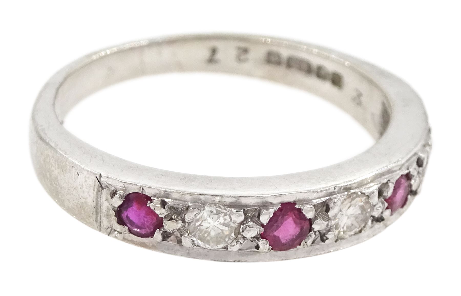 18ct white gold ruby and round brilliant cut diamond half eternity ring, London 1978