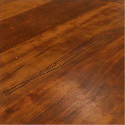 Large oak and pine farmhouse table, with pine plank top raised on and oak base with turned supports united by a long stretcher 