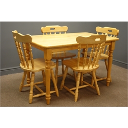  Pine farmhouse style kitchen table, turned supports, (W77cm, H76cm, L122cm), and four spindle back chairs, shaped cresting rail  