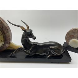 Art Deco style marble and anodised spelter three-piece clock garniture, model with recumbent gazelle, centre piece L52cm.  
