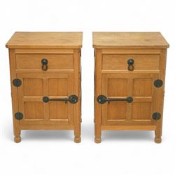 Beaverman - pair of oak bedside cabinets, each with plain rectangular top over single draw...