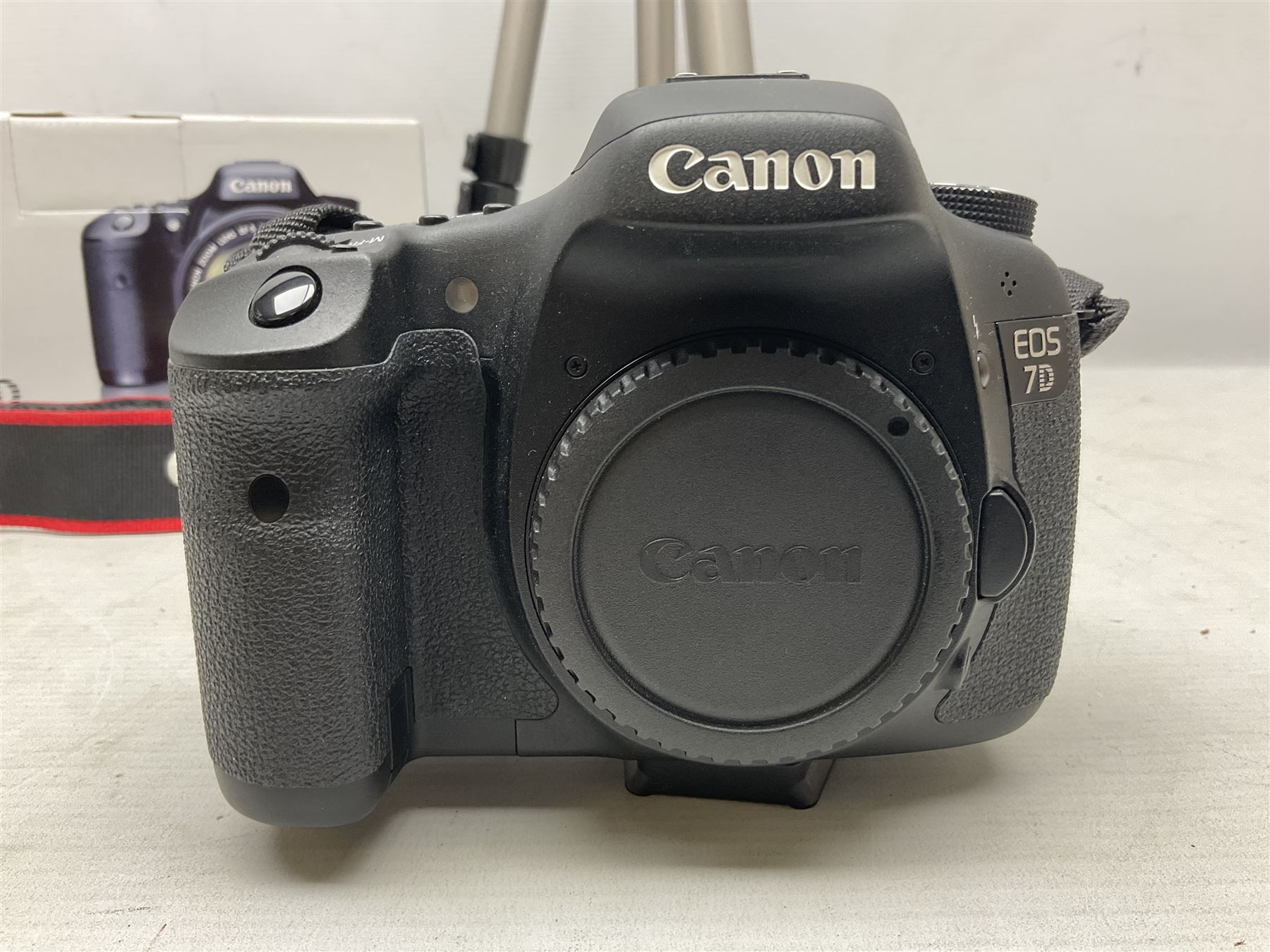 Canon Eos 7D camera body, serial number 3261306344, with 'Canon Ultrasonic EF 24-105mm Macro 0.45m/1.5ft Ultrasonic' Lens, 'Canon Zoom EF 75-300, 1;4-5.6 III' lens and Teleplus Pro 300 lens, together with tripod and original camera box 