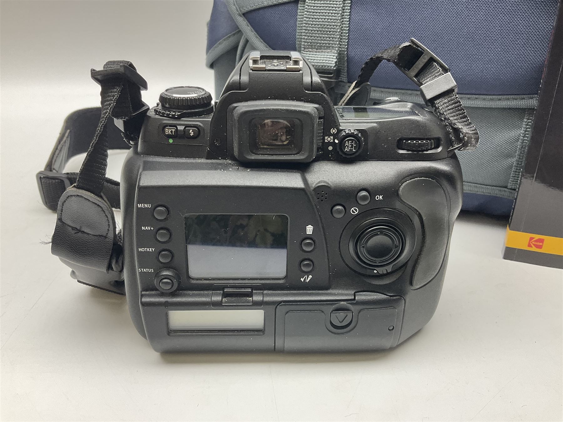 Kodak DCS pro, with Nikon F80 mount, serial no. PSLRN24607, with three batteries, charged, instruction manual and a carry case