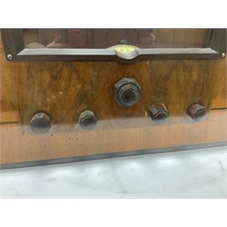 1930s Marconi Type 561 valve radio, in shaped Art Deco case with woven brass overlaid speaker, circa 1937, H58cm W50cm