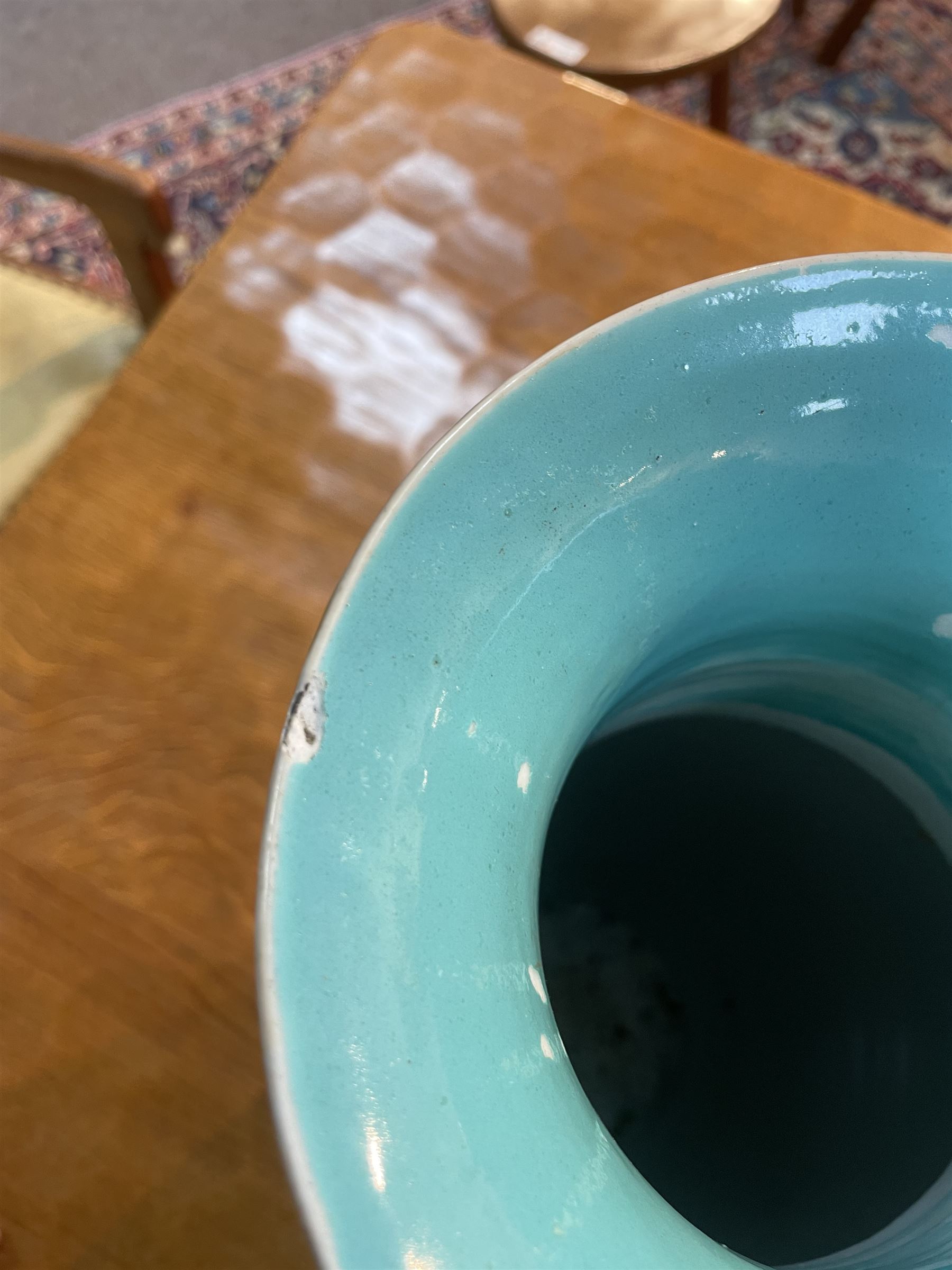 19th century Chinese famille rose yellow ground porcelain vase, of baluster form with twin applied mask ring handles, the body decorated with two shaped reserves mounted with dragon heads, depicting warriors at battle and at court, the neck with two smaller conforming figural reserves, upon a yellow ground decorated with exotic birds amidst scrolling blossom, H45.cm