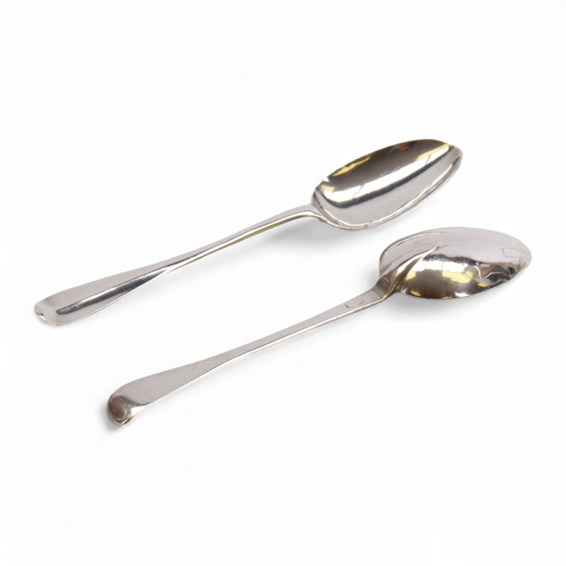 Two early/mid 18th century American silver Hanovarian pattern tablespoons with rat tail bowls, the first example marked for John Burt, Boston, circa 1730, the second marked for George Hanners, Boston, each approximately L19cm