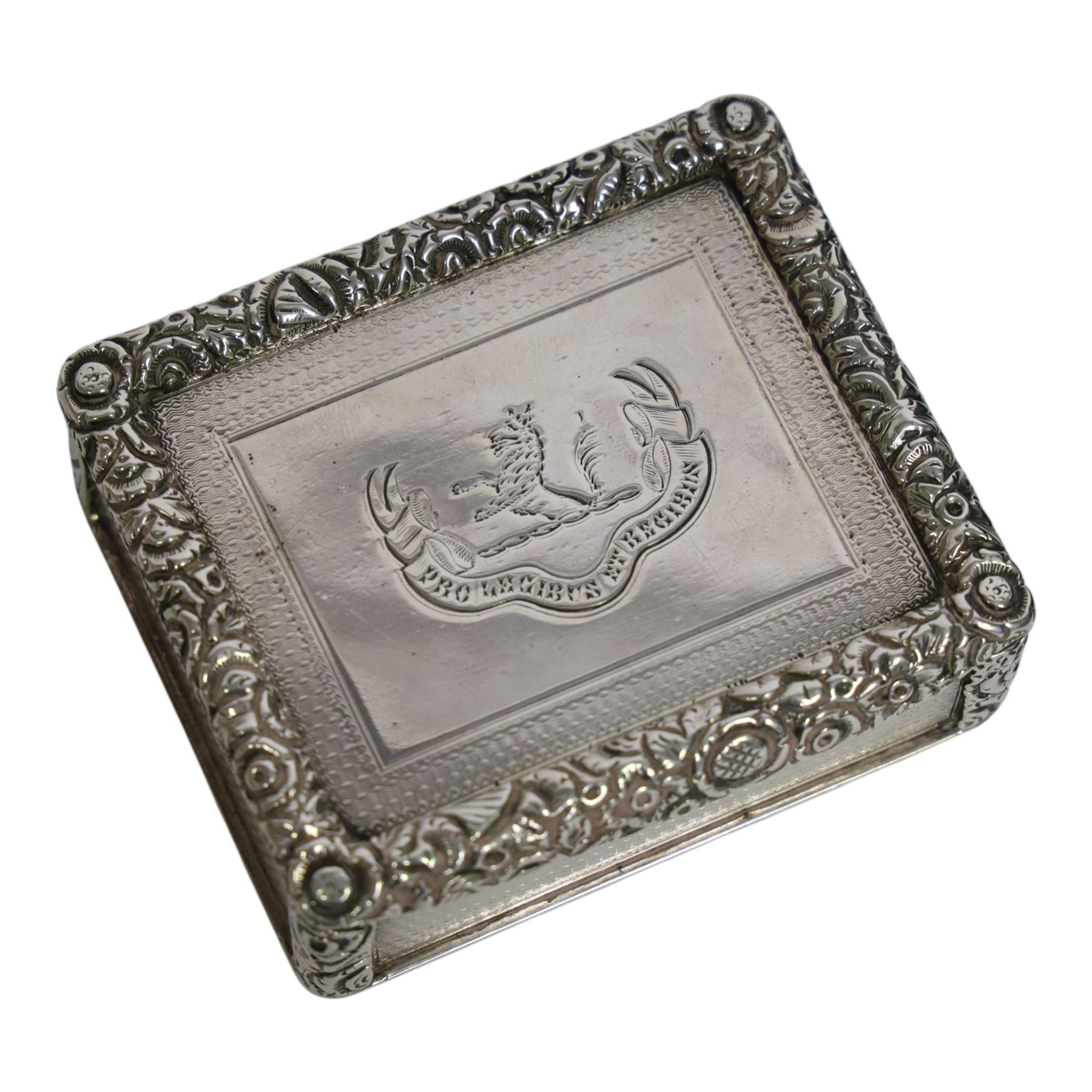 Rare Victorian silver provincial snuff box, of rounded rectangular form, the hinged cover with central engraved crest above motto 