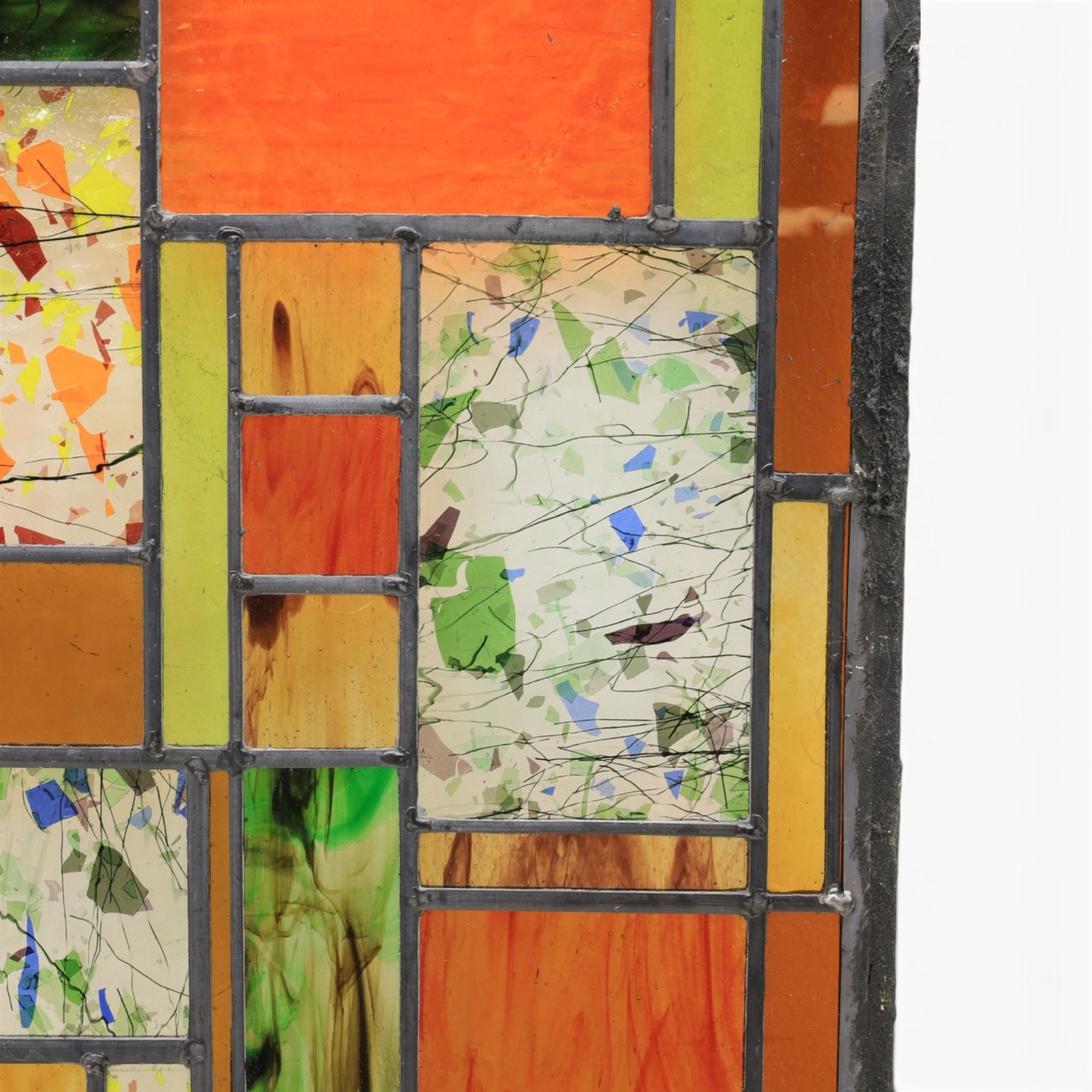 Valerie Green - 21st century stained glass and leaded panel, in green, orange and yellow colourways   
