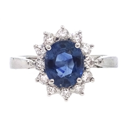  18ct white gold sapphire and diamond cluster ring, hallmarked, sapphire approx 1.2carat  