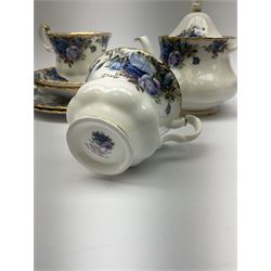Royal Albert teaset for two, comprising teapot, two tea cups and two saucers, two side plates, milk jug, and open sucrier, decorated in the Moolight Rose pattern. 