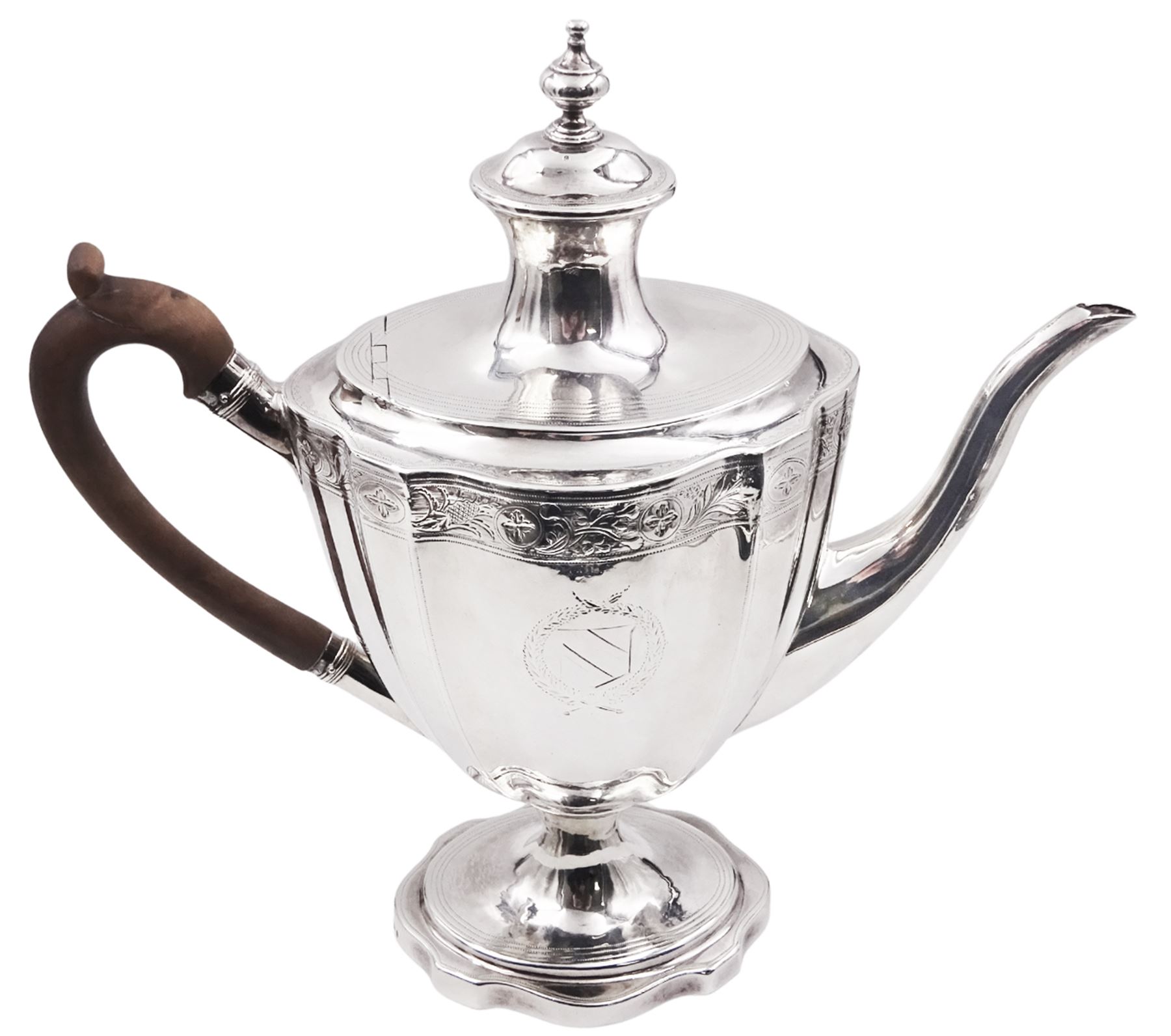 George III silver coffee pot, of vase form with part faceted sides and wooden scroll capped handle, the body engraved with central crest and finial border, hallmarked London 1796, makers mark partly worn and indistinct, H29.5cm, approximate gross weight 25.53 ozt (794.3 grams)