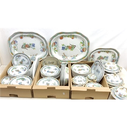 A matched Copeland Spode dinner service, decorated in a chinoiserie style pattern, to include eighteen dinner plates, seven dessert plates, fourteen soup bowls, four tureens (one lacking cover), ten assorted serving platters, jug, etc. 