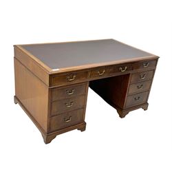Edwardian mahogany twin pedestal desk, rectangular burgundy leather top moulded edge, over three short drawers with brass swan neck handles, over twin pedestals with graduating drawers supported on bracket feet