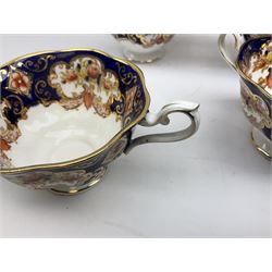 Royal Albert heirloom pattern tea service for twelve, comprising twelve cups and saucers, two milk jugs, two sucriers, twelve dessert plates and two cake plates