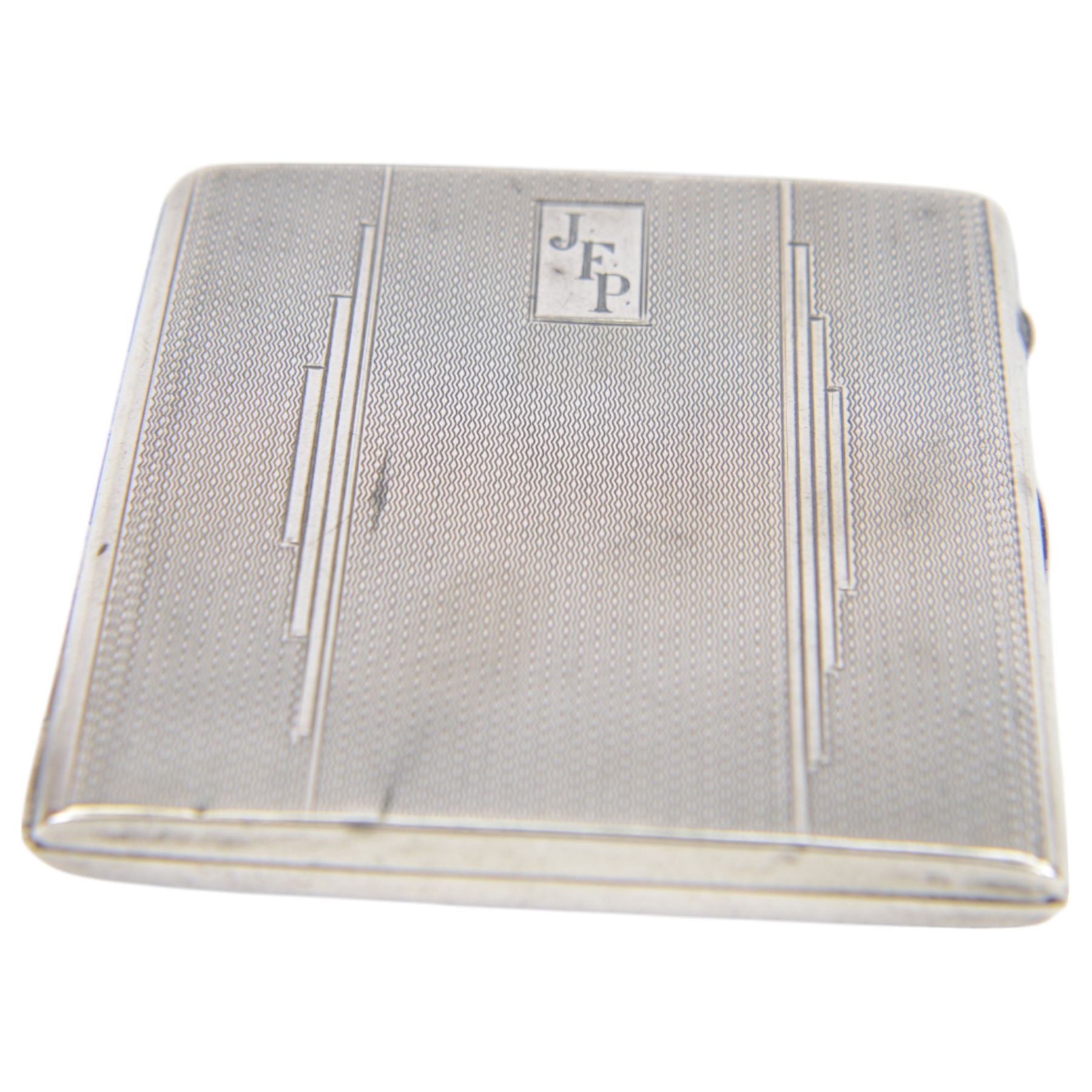 George III silver snuff box, of curved rectangular form with personal engraving to lid, hallmarked London 1805, together with two 1920s/30s silver cigarette cases, both hallmarked
