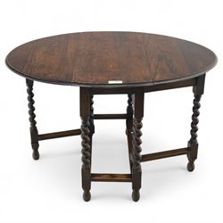 20th century oak gateleg table, with oval fold-out top supported on turned barley twist legs and stretchers (Extended 116cm)