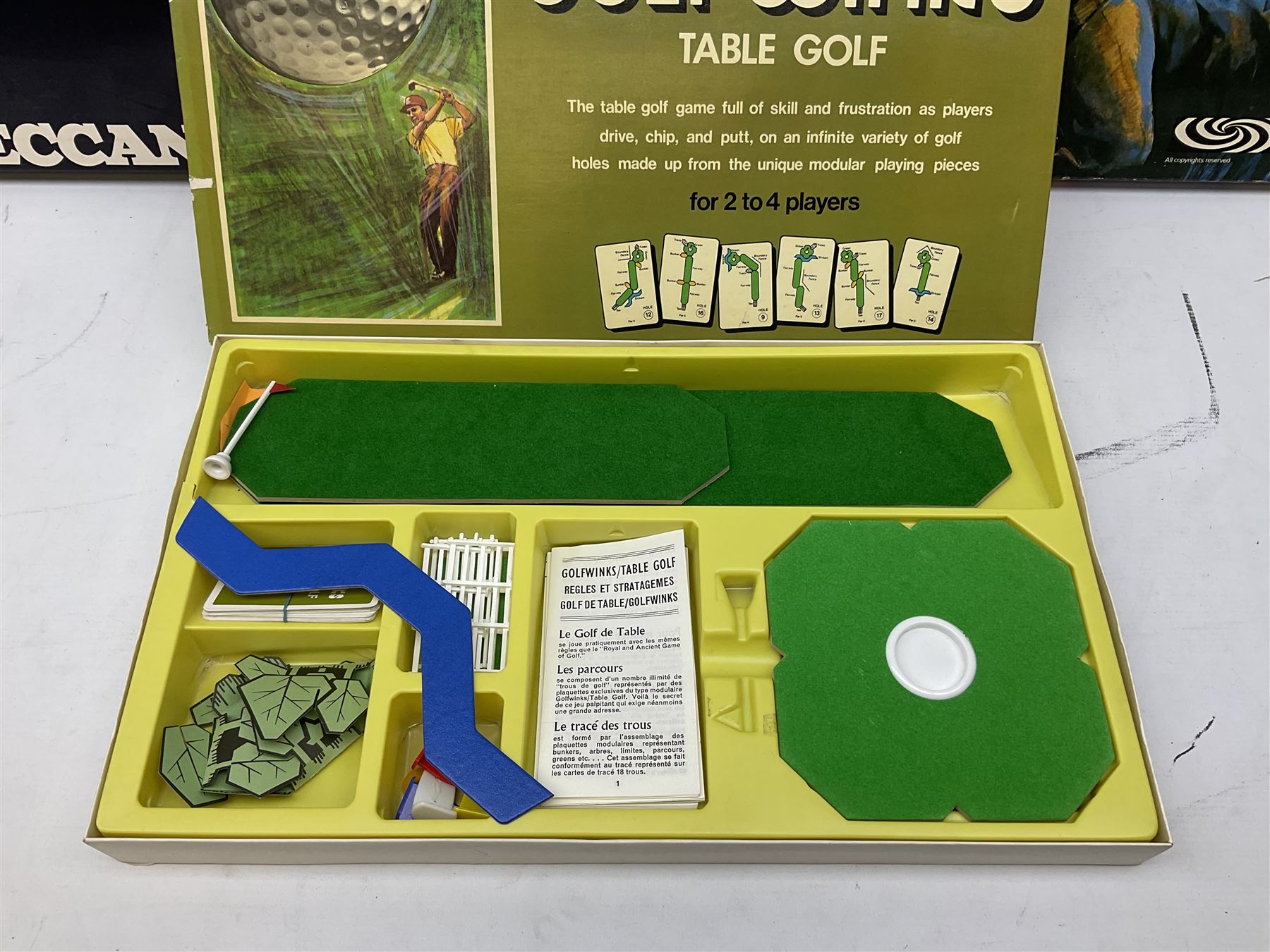 Meccano - Set No.5 with instruction booklets and Set 1+1X Conversion Set; both boxed; Adman Grandstand TV Game; boxed; Parker Colditz Board Game; and four Waddingtons Board Games including Cube Fusion, Totopoly, Golf Winks and Buccaneer; all boxed (8)