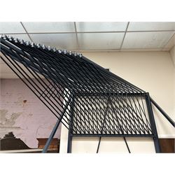 Commercial Rug Display Rack, painted steel, 20 swing arms, can fit 40 rugs back to back