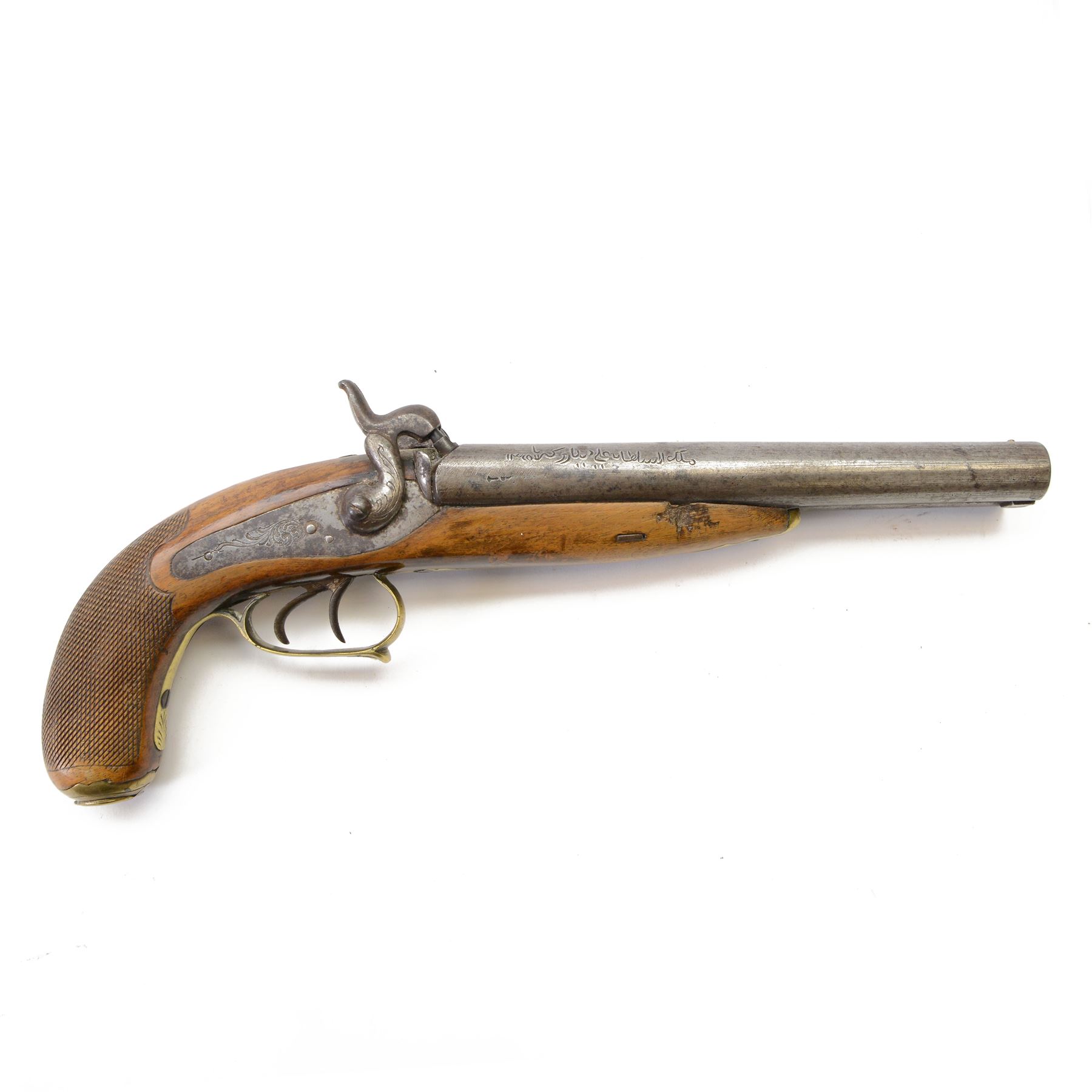 19th century double-barrelled percussion pistol the side by side barrels engraved with Arabic script, engraved with floral motifs, chequered wooden grip with engraved brass butt cap, L37CM