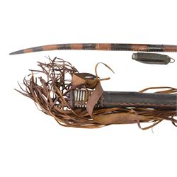 Tuareg hunting dagger, together with military penknife, drum, leather covered spear etc