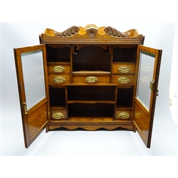  Large early 20th century oak smokers cabinet with two, part glazed panel doors and fitted interior, the shaped cresting with plaque inscribed 'Presented to Bro. W G Loraine on Aug 31.13 as a mark of Appreciation by The Railwaymen of Manchester District', H62cm, W55cm, D20cm. W G Loraine was President of The Amalgamated Society of Railway Servants in 1902. Founded in 1871, the ASRS eventually merged wth ASLEF,GRWU & UPSS to form The National Union of Railwaymen in1913.   