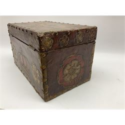 20th century box, decorated in faux leather with the royal coat of arms and GR 1719 to hinged cover, with fleur-de-lis, lion, crown and rose motifs throughout and studs to all edges, opening to reveal a purple velvet interior containing three removable wooden trays, H18.5cm