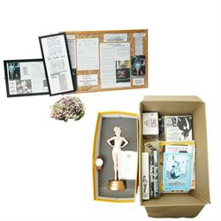 Betty Grable -  A purse designed as a bunch of violets and used by Betty Grable in the film 'Sweet Rosie O'Grady' 1943 and won in a competition in the Sunday Pictorial newspaper by Beth Jackson with newspaper cuttings, letter, photographs etc, together with a limited edition figure of Betty Grable by Modern Icons 458/2500, with magazines, books and other items relating to Betty Gable