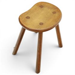 Lizardman - oak milking stool, shaped top with four octagonal supports with carved lizard signature by Derek Slater of Crayke