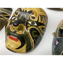 Five Japanese theatre / opera masks, the papier-mâché traditionally painted in the Noh Kabuki style, L18cm