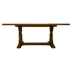Mouseman - oak 6' refectory dining table, rectangular adzed and pegged top, two octagonal pillar supports on sledge feet joined by floor stretcher,  carved with mouse signature, by the workshop of Robert Thompson, Kilburn