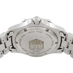 Tag Heuer gentleman's stainless steel quartz wristwatch, Ref. WK1112-0, silvered dial with baton hour markers and date aperture, on original stainless steel bracelet, with fold-over clasp