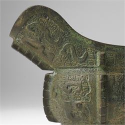 Chinese archaistic bronze wine vessel, Shang dynasty style but 20th century, W25cm; together with a Tang dynasty style model of a rearing horse, H17.5cm (2)