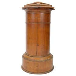 Victorian oak Country House domestic post box, of cylindrical form with hexagonal moulded domed top above a rectangular posting aperture detailed 'LETTERS', and hinged door with glazed aperture for posting times, upon a circular plinth with pull our drawer and canted drop handle, overall H43cm