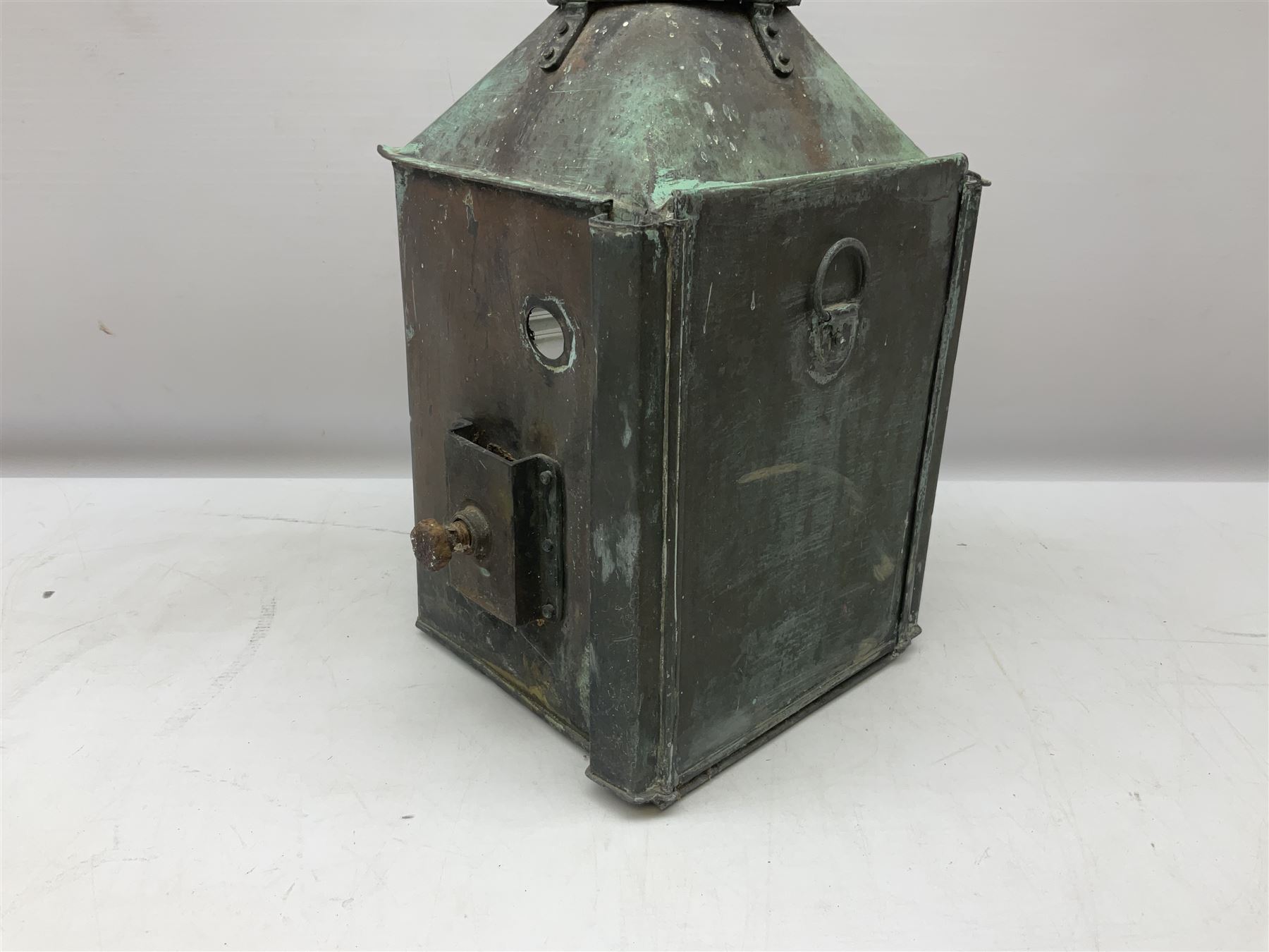 20th century Alderson & Gyde Ltd copper ship lantern, with swing handle and a plaque inscribed Bow Port Patt 23 and ribbed clear glass shade