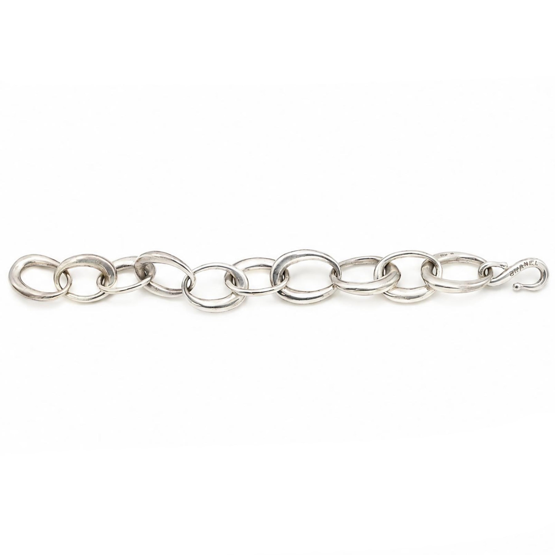 Chanel silver bracelet, with ten oval interlocking links and a hook clasp, London 2000