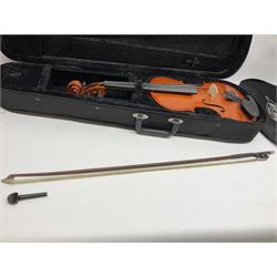 Dean small or child's size electric guitar in black, serial no.O09121956 L85cm; in gig bag; and modern student's violin with 35.5cm two-piece back in fitted carrying case with older bow (2)