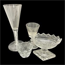  18th century drinking glass, the drawn funnel bowl upon a double series opaque twist stem and conical foot, H17cm, together with an 18th century dram glass, the bucket bowl crudely engraved with heraldic style shield, upon a knopped stem and folded circular foot, H9.5cm, and two open salts, one of navette form