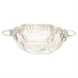 Three mid 20th century silver bowls, including two circular examples with pierced sides and a square example with twin handles, all hallmarked