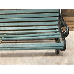 Early 20th century slatted garden bench with scrolling cast iron bench ends