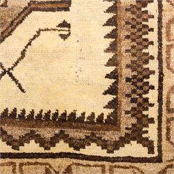 North West Persian Gabeh hand-knotted rug, natural ivory field with a vertical sequence of three large stepped geometric medallions in soft shades of brown and taupe, each enclosing stylized tribal motifs, flanked by narrow guard borders incorporating chevron and zigzag designs, with fringe ends 